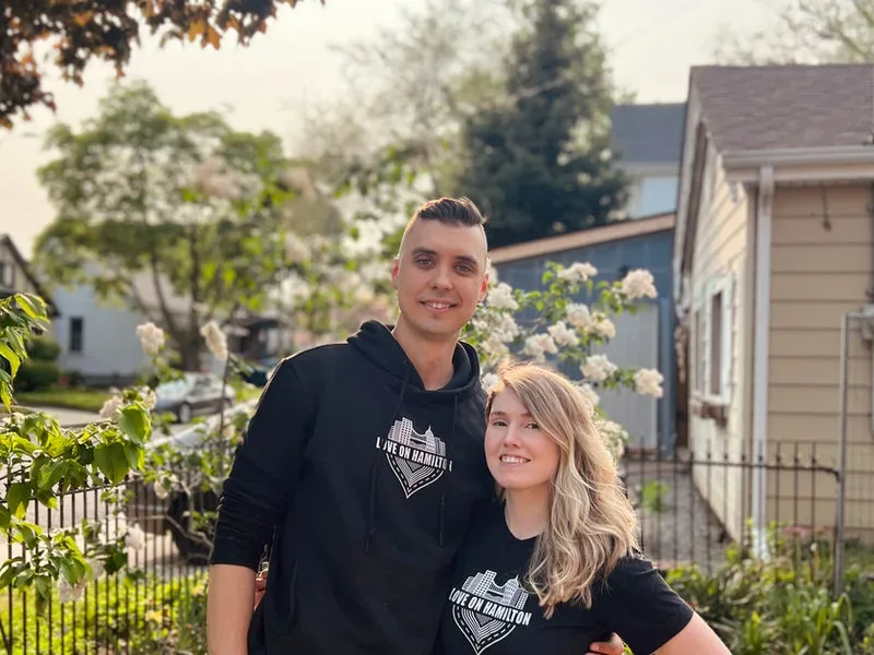 Daniel and Katie Ziedins wearing Love on Hamilton shirts